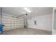 Well-lit garage with epoxy flooring and plenty of storage space at 288 Soliera St, Nokomis, FL 34275