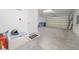 Well-organized garage with storage accessories and epoxy floor at 288 Soliera St, Nokomis, FL 34275