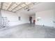 Spacious two-car garage with bright lighting, concrete floor, and plenty of room for storage at 288 Soliera St, Nokomis, FL 34275