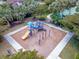 Aerial shot of a playground with a slide and climbing equipment at 288 Soliera St, Nokomis, FL 34275