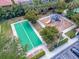 Aerial shot of a bocce court and playground with a slide and climbing equipment at 288 Soliera St, Nokomis, FL 34275
