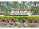 The Toscana Isles stone sign is surrounded by lush landscaping, creating an inviting entrance at 288 Soliera St, Nokomis, FL 34275