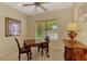Dining area with a large window offering natural light and views at 335 Auburn Woods Cir, Venice, FL 34292
