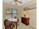 Charming dining area with natural light and a view of the outdoors at 335 Auburn Woods Cir, Venice, FL 34292
