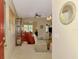 View from foyer featuring living and dining rooms with neutral decor at 335 Auburn Woods Cir, Venice, FL 34292