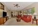 Spacious living room featuring an open floor plan, and comfortable seating at 335 Auburn Woods Cir, Venice, FL 34292