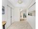 Inviting entryway with tile floors and a view into the living room at 351 Eden Dr, Englewood, FL 34223