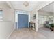 Home foyer featuring tiled floors, double doors with side lights and transom, and neutral paint colors at 351 Eden Dr, Englewood, FL 34223