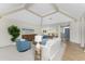 Open concept living room features high ceilings and neutral color scheme at 351 Eden Dr, Englewood, FL 34223