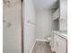 Bright bathroom featuring tiled shower, vanity, and modern fixtures at 429 Cerromar Ln # 352, Venice, FL 34293