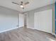 This bedroom has a ceiling fan and closet at 429 Cerromar Ln # 352, Venice, FL 34293