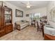 Comfortable office featuring a bookcase, sleeper sofa, and desk with natural light at 432 Sunset Lake Blvd # 205, Venice, FL 34292