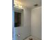 Bathroom featuring a large mirror, a shower with gray stone-look tiles and exposed plumbing at 500 Park S Blvd # 62, Venice, FL 34285