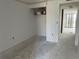 Spacious bedroom with a closet, neutral walls and flooring, awaiting personalization to create a comfortable retreat at 500 Park S Blvd # 62, Venice, FL 34285