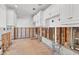 Partially renovated kitchen features white cabinetry, recessed lighting, and open framework at 500 Park S Blvd # 62, Venice, FL 34285