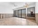 Interior showing exposed framework and sliding glass doors leading to a beachfront view at 500 Park S Blvd # 62, Venice, FL 34285