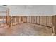 Spacious living room being renovated with exposed framing and block walls at 500 Park S Blvd # 62, Venice, FL 34285