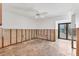 Open living area with exposed wall framing, awaiting renovation and design at 500 Park S Blvd # 62, Venice, FL 34285