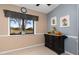 Bright breakfast nook with a large window overlooking the outdoor landscape at 500 Wekiva River Ct # 129, Englewood, FL 34223