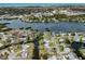 Aerial view of a waterfront property, highlighting the surrounding waterways at 504 Buena Vista Dr, Nokomis, FL 34275