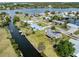 Aerial view showcasing waterfront property on a canal at 504 Buena Vista Dr, Nokomis, FL 34275