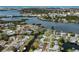 Beautiful aerial view of the waterfront property, showcasing canal access and proximity to the bay and Gulf of Mexico at 504 Buena Vista Dr, Nokomis, FL 34275