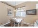 Cozy breakfast nook, a charming space for enjoying meals at 5223 Pine Shadow Ln, North Port, FL 34287