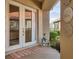 Cozy front porch with decorative accents and a welcoming entrance at 5223 Pine Shadow Ln, North Port, FL 34287