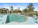 Refreshing community pool with lounge chairs for relaxation and leisure at 5725 Greenwood Ave # 1201, North Port, FL 34287