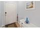 Entryway with tile floor and white table with decorative vase next to entry door at 5725 Greenwood Ave # 1201, North Port, FL 34287