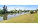 Relaxing water view with lush greenery and trees along the river at 5725 Greenwood Ave # 1201, North Port, FL 34287