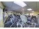 View of the gym featuring cardio machines, free weights, and ample space for fitness activities at 612 Bird Bay S Dr # 311, Venice, FL 34285
