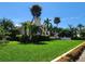 Charming home featuring lush landscaping, a well-manicured lawn, and beautiful curb appeal at 616 Guild Dr # 2, Venice, FL 34285