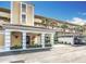 Charming covered entrance to the condo building with well-maintained landscaping and convenient parking at 839 Wexford Blvd # 839, Venice, FL 34293