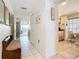 Inviting condo foyer with tile flooring leading to the living area and dining space at 839 Wexford Blvd # 839, Venice, FL 34293