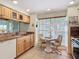 Functional kitchen features ample counter space, convenient breakfast nook, and modern appliances at 839 Wexford Blvd # 839, Venice, FL 34293