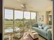 Enclosed lanai with golf course views, perfect for relaxing and entertaining at 839 Wexford Blvd # 839, Venice, FL 34293