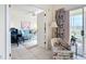 Inviting living room with access to a screened patio offering serene views and comfortable seating at 839 Wexford Blvd # 839, Venice, FL 34293