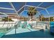Serene pool and spa with covered screen, providing a luxurious backyard retreat for relaxation and entertainment at 8432 Culebra Ave, North Port, FL 34287