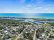 Gorgeous waterfront community with boat docks, sandy beaches, and tropical vegetation at 863 Southland Rd, Venice, FL 34293