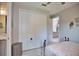 Bedroom with large closet and access to the bathroom and kitchen at 863 Southland Rd, Venice, FL 34293