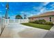 Long driveway leading to a well maintained, landscaped property at 863 Southland Rd, Venice, FL 34293