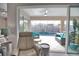 Inviting screened-in pool area with comfortable seating and a tranquil view, accessible from the living space at 863 Southland Rd, Venice, FL 34293