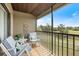 Relaxing balcony features comfortable seating and scenic views of the outdoors at 925 Capri Isles Blvd # 4, Venice, FL 34292