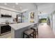Stylish kitchen with stainless steel appliances and marble countertops at 925 Capri Isles Blvd # 4, Venice, FL 34292