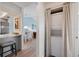 Convenient laundry area featuring a stacked washer and dryer, discreetly tucked away at 925 Capri Isles Blvd # 4, Venice, FL 34292