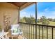 Relaxing screened patio with comfortable seating and serene green views at 925 Capri Isles Blvd # 4, Venice, FL 34292