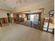 Partially renovated living room showing tile floor, and open floor plan at 926 Inlet Cir, Venice, FL 34285