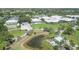 A bird's-eye view of this community with an inviting body of water at 934 Wexford Blvd # 934, Venice, FL 34293