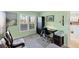 Bright room features neutral carpet, modern window, and desk workspace area at 934 Wexford Blvd # 934, Venice, FL 34293